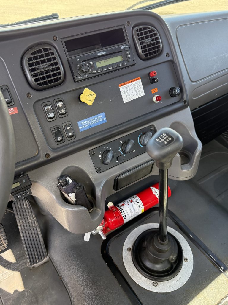 997 E